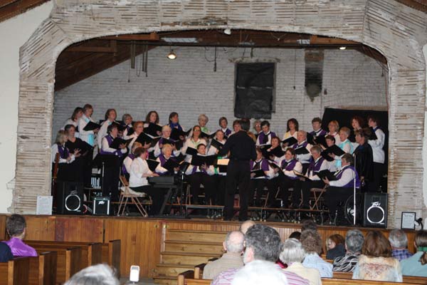 Bel Canto and Tapestry Choirs on Harrington Opera House Stage in 2010