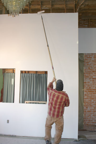 painting new sheetrock Harrington Opera House lobby office