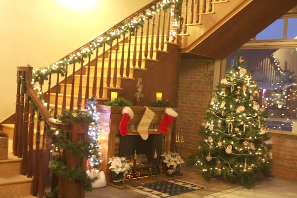 HOHS stairway from lobby deorated for Christmas