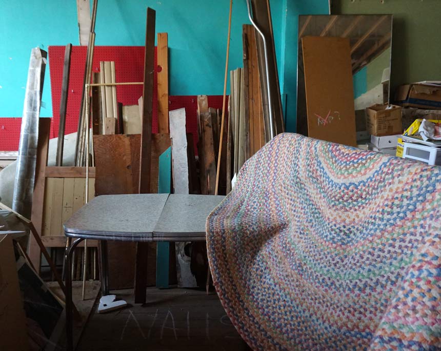 braided rug, table, wood, other rummage items